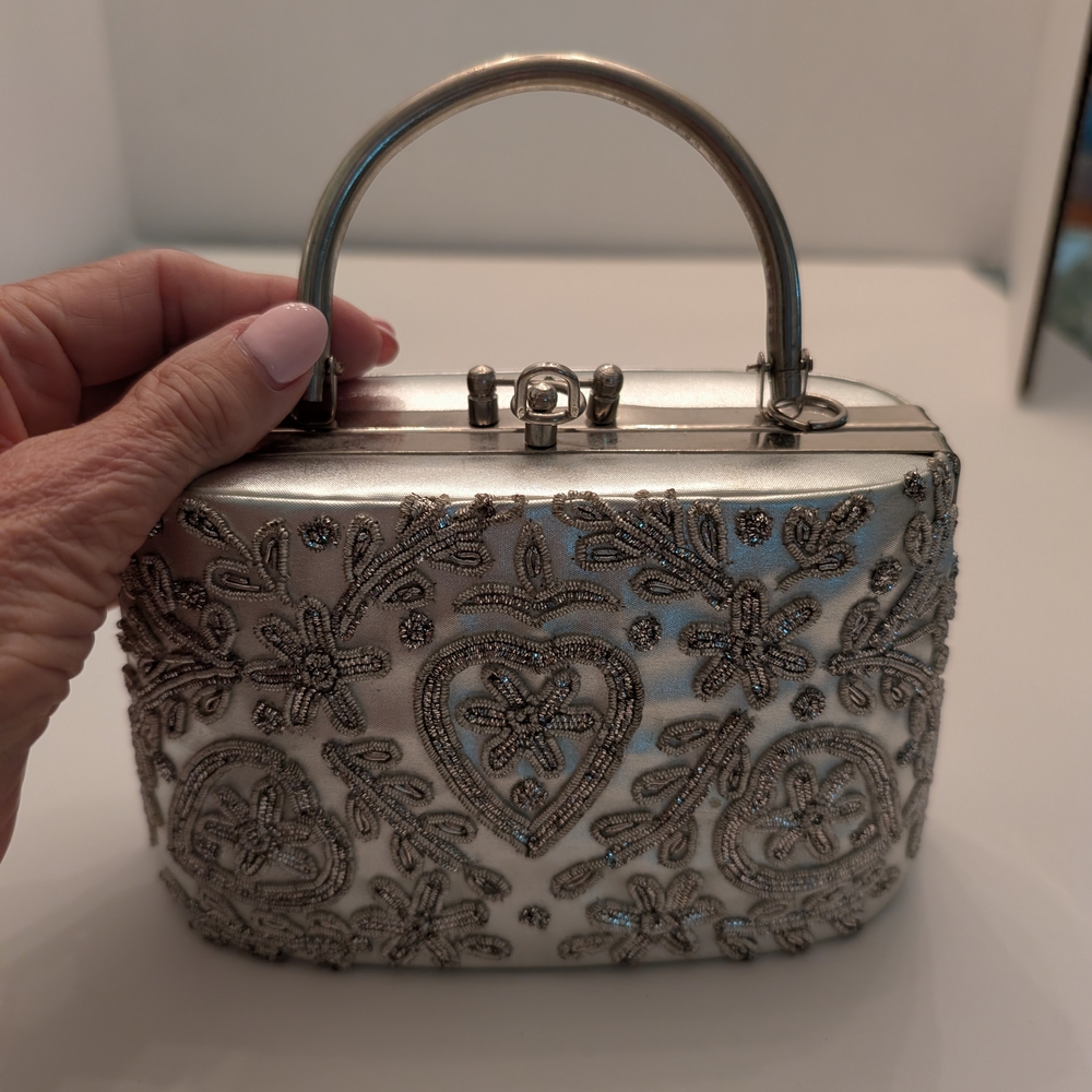 Stunning Silver Clutch with Chrome Accents
